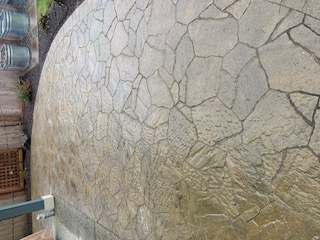 Flagstone patio — natural irregular stone hand-laid with tight joints