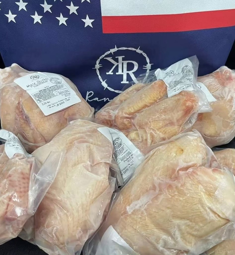 KR Ranches branded vacuum-sealed whole chickens on an American flag bag